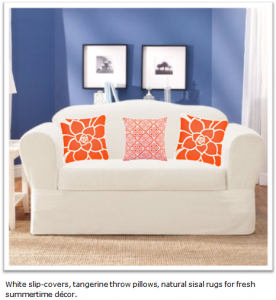 White slip covers, tangerine throw pillows, sisal rugs for summer time decor. Click to purchase white twill slip covers at Amazon.