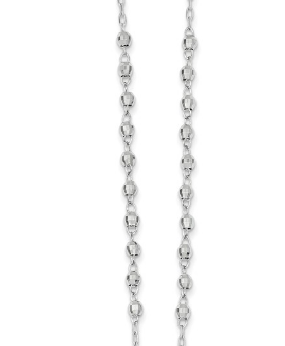 Close up of diamond-cut faceted rhodium plate 14k white gold rosary beads.