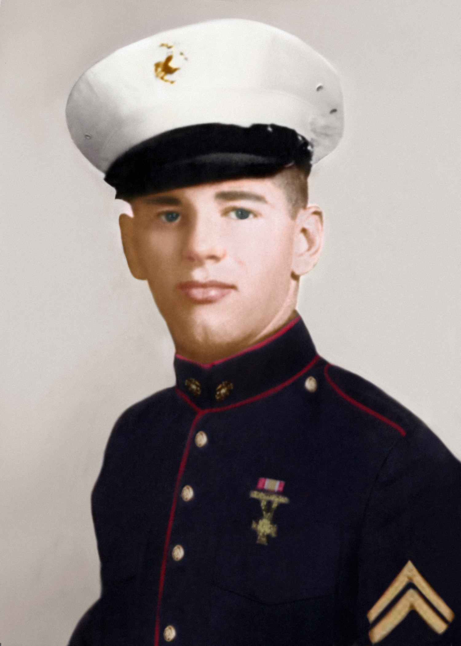 Richard Brockman in his Marine Dress Blues, the ribbon on his uniform is the World War II victory ribbon for the Marine Corps.