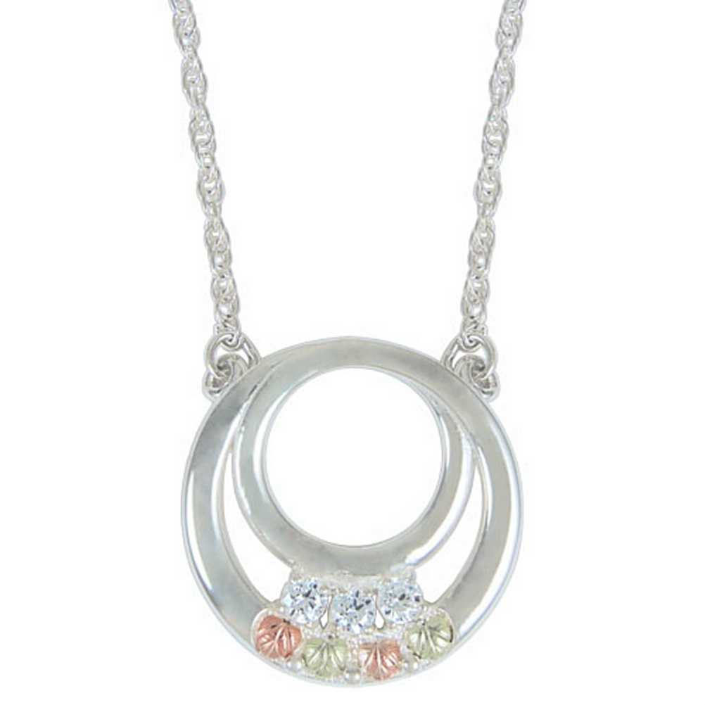 Double circle pendant with three cubic zirconia and 12k rose ad green gold flowers. Sterling silver necklace is 18 inches long.