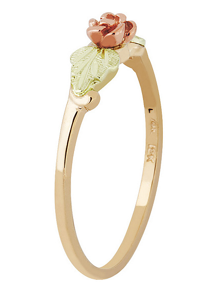 Slim profile band features the iconic 12k rose gold Dakota Rose flanked with a hand-placed 12k green gold leaf on each side of the 3D rose. Ring is crafted in 10l yellow gold.