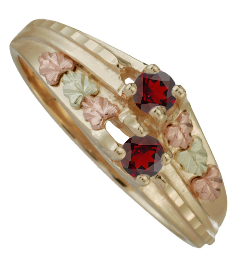 Garnet Black Hills Gold Motif ring in 10k yellow gold, 12k rose gold and 12k green gold.