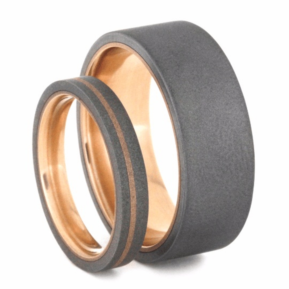 His and Hers Wedding Band Set, Sandblasted Titanium, 14k Rose Gold Pintripe Ring and Men's Sandblasted Titanium, 14k Rose Gold Sleeve Band.