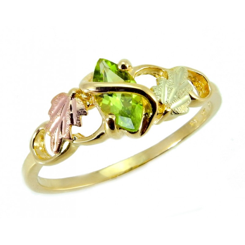 10K yellow gold Ring with Gemstone and Black Hills Gold motif. 