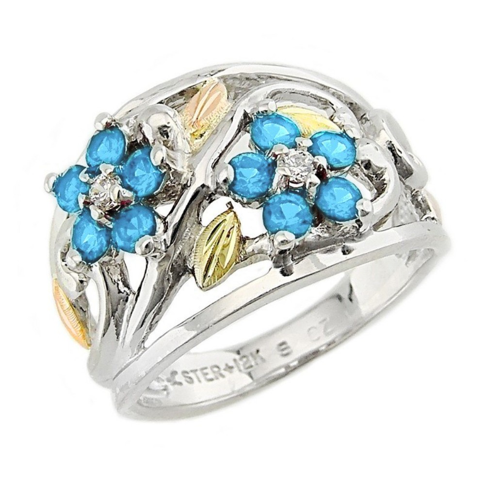 black-hills-gold-on-silver-created-blue-topaz-brithstone-flower-ring-LR986-SS. 