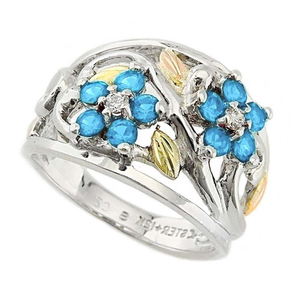 black-hills-gold-on-silver-created-blue-topaz-brithstone-flower-ring-LR986-SS. 