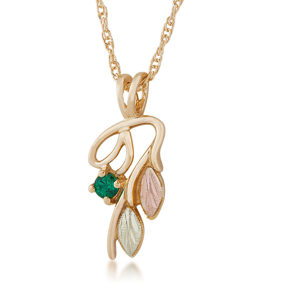 Black Hills Gold Necklace with Leaf Motif and Emerald accent. 