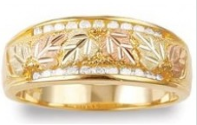 Diamond-cut, hand-engraved, hand-placed 12k rose and green gold grape leaves are framed by 11 channel-set diamonds on top of tapered band and 11 channel-set diamonds on the bottom of the band. Men's band is .38 inches wide, womens is .31 inches wide.