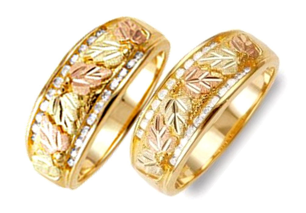 Each wedding band contains 22 diamonds; bands are crafted in 10k yellow gold, 12k rose gold, 12k green gold.